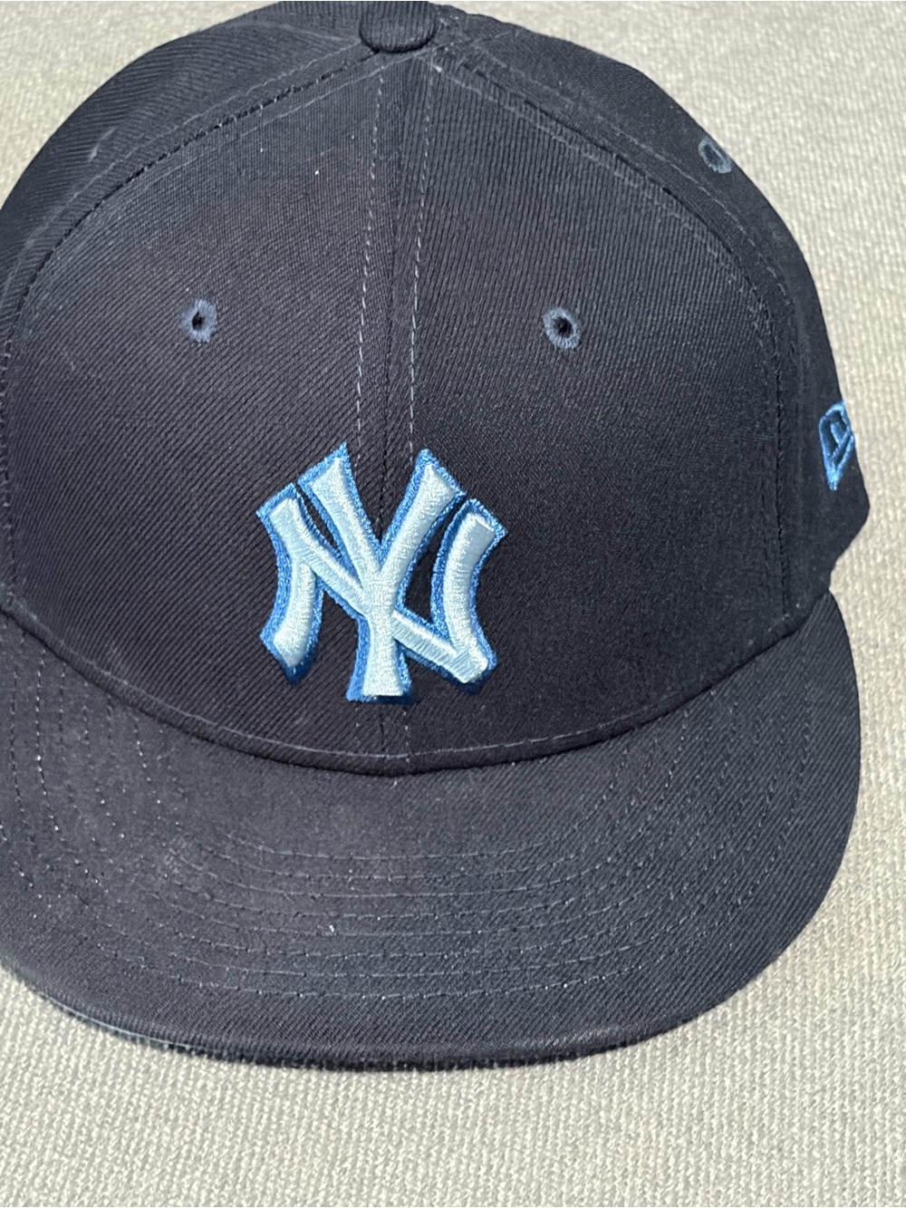 New Era Black Cap with Light Blue NY Logo